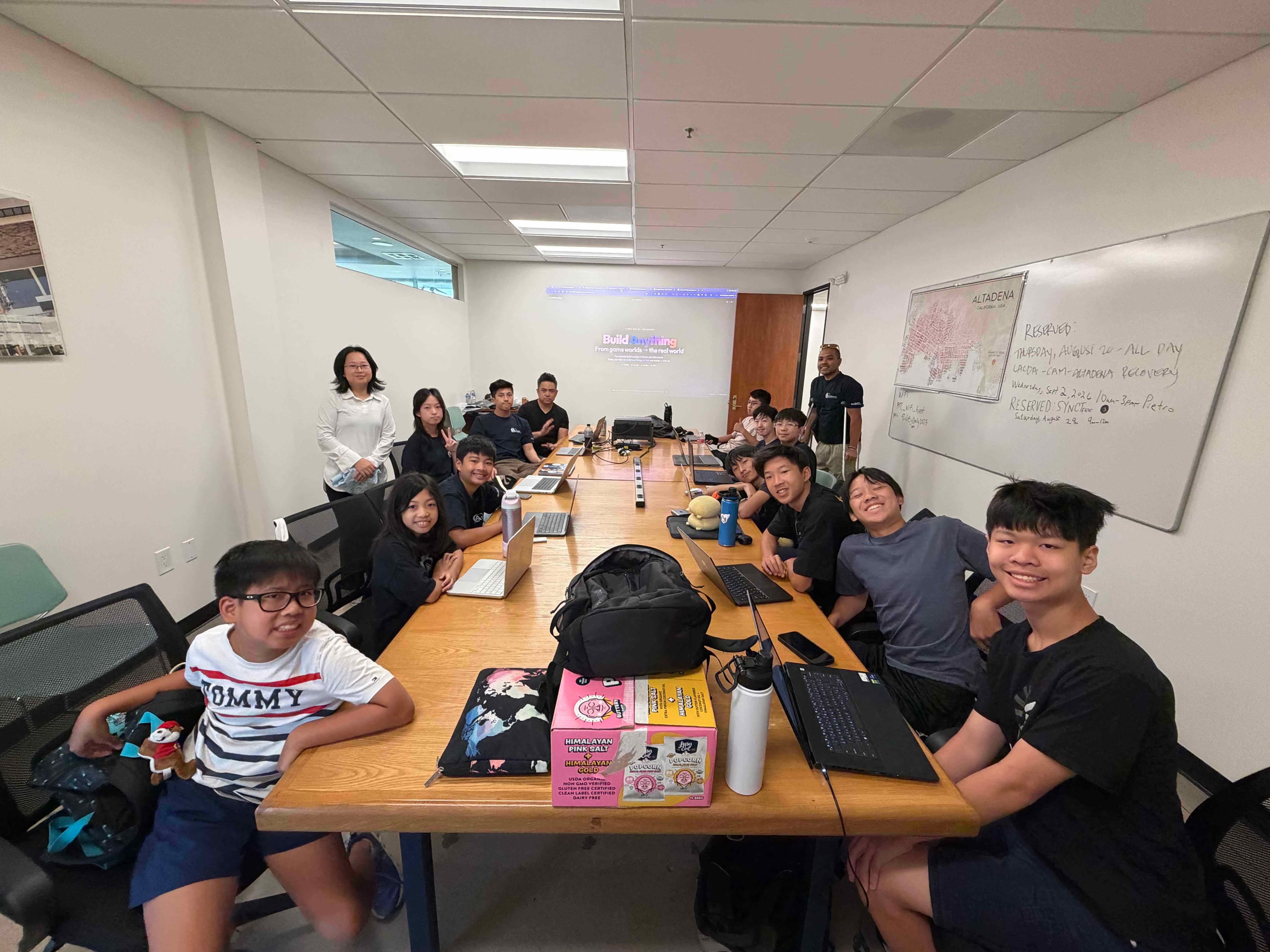 Students learning app development during the CHEER seminar